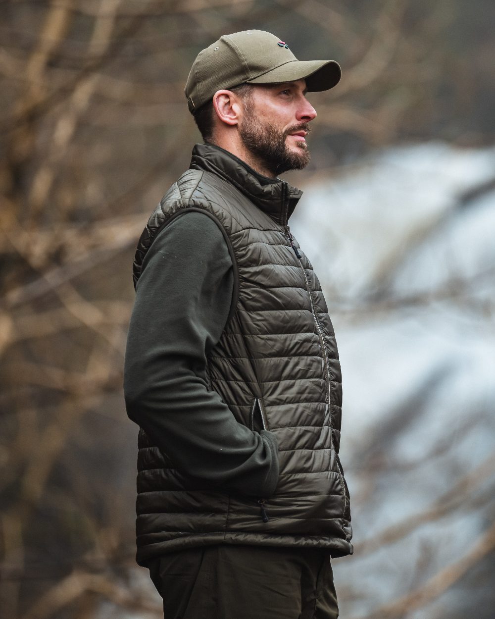 Olive/Merlot coloured Hoggs of Fife Kingston Rip-Stop Gilet on forest background