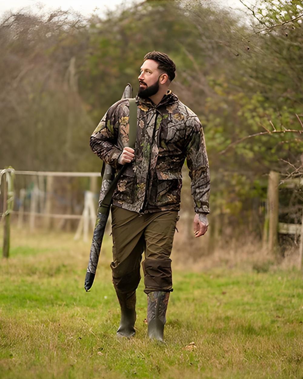 EVO coloured Jack Pyke Rannock Jacket on forest background 