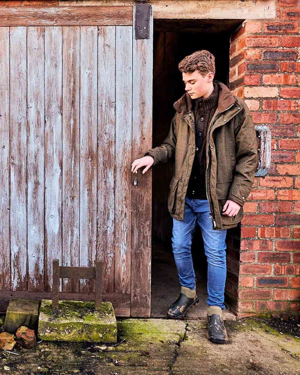 Moss Coloured Muck Boots Mens Woody Sport Ankle Boots On A Shelter Background