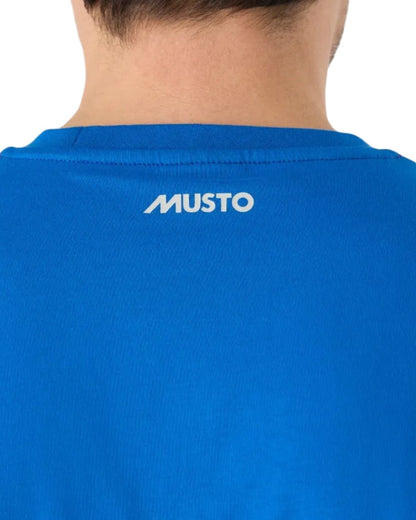 Aruba Blue Coloured Musto Logo Tee On A White Background 