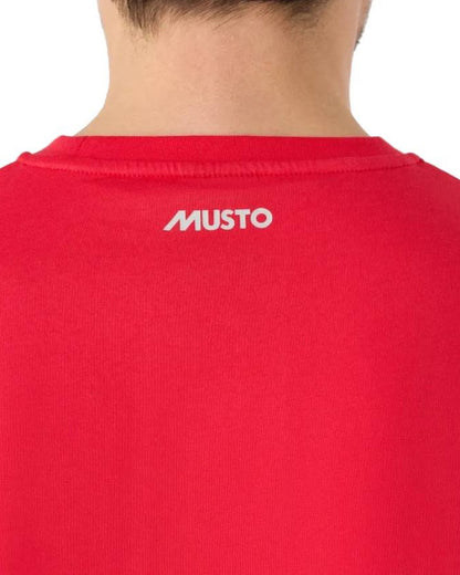 True Red Coloured Musto Logo Tee On A White Background 