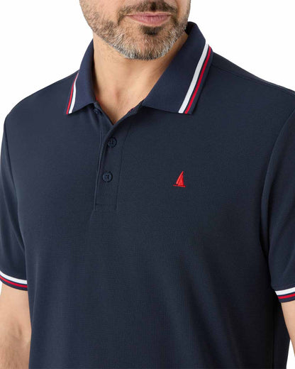 Navy coloured Musto Mens Evolution Pro Lite Short Sleeved Polo on White background 