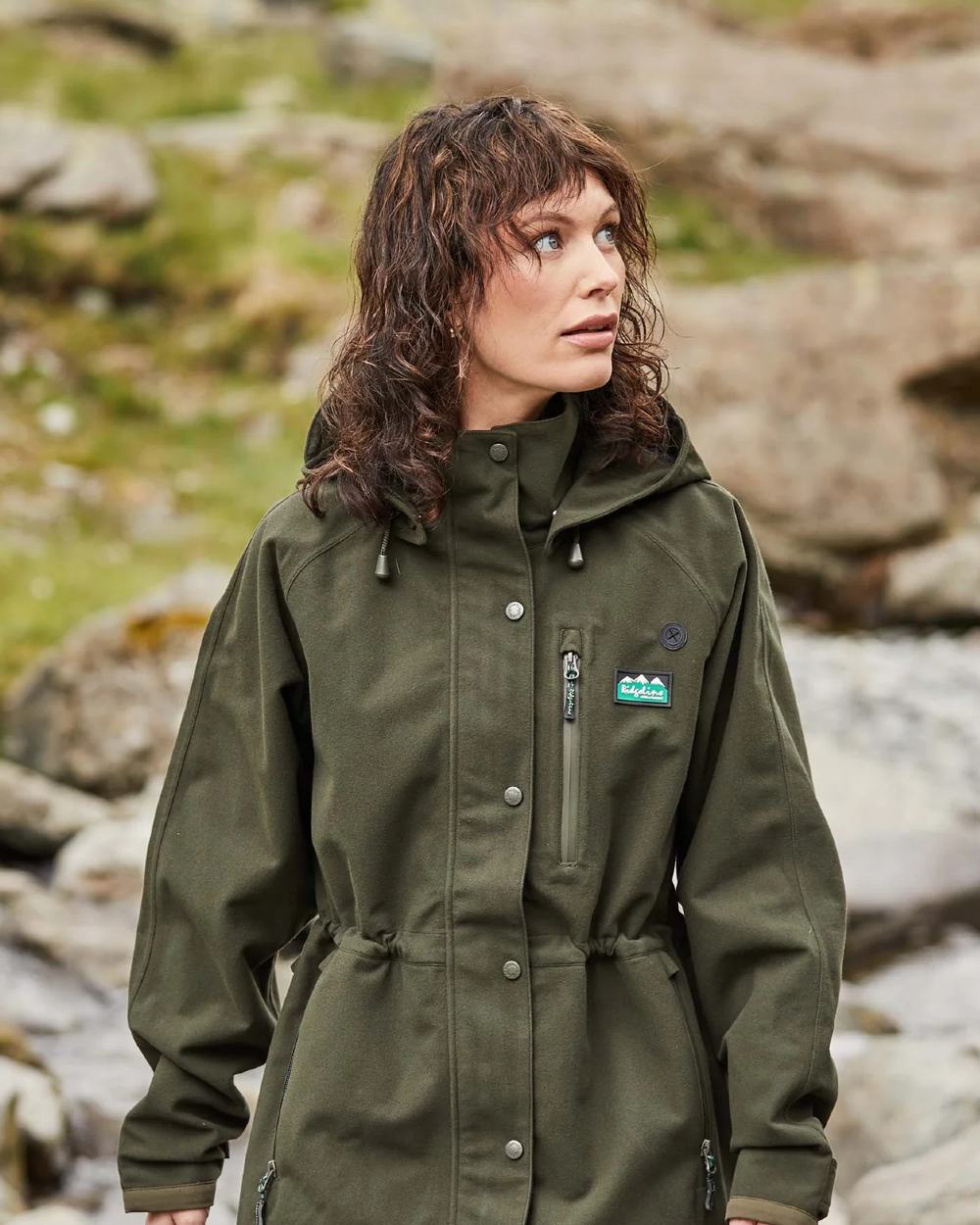 Deep Forest Coloured Ridgeline Ladies Monsoon II Classic Jacket On A Hill Background 