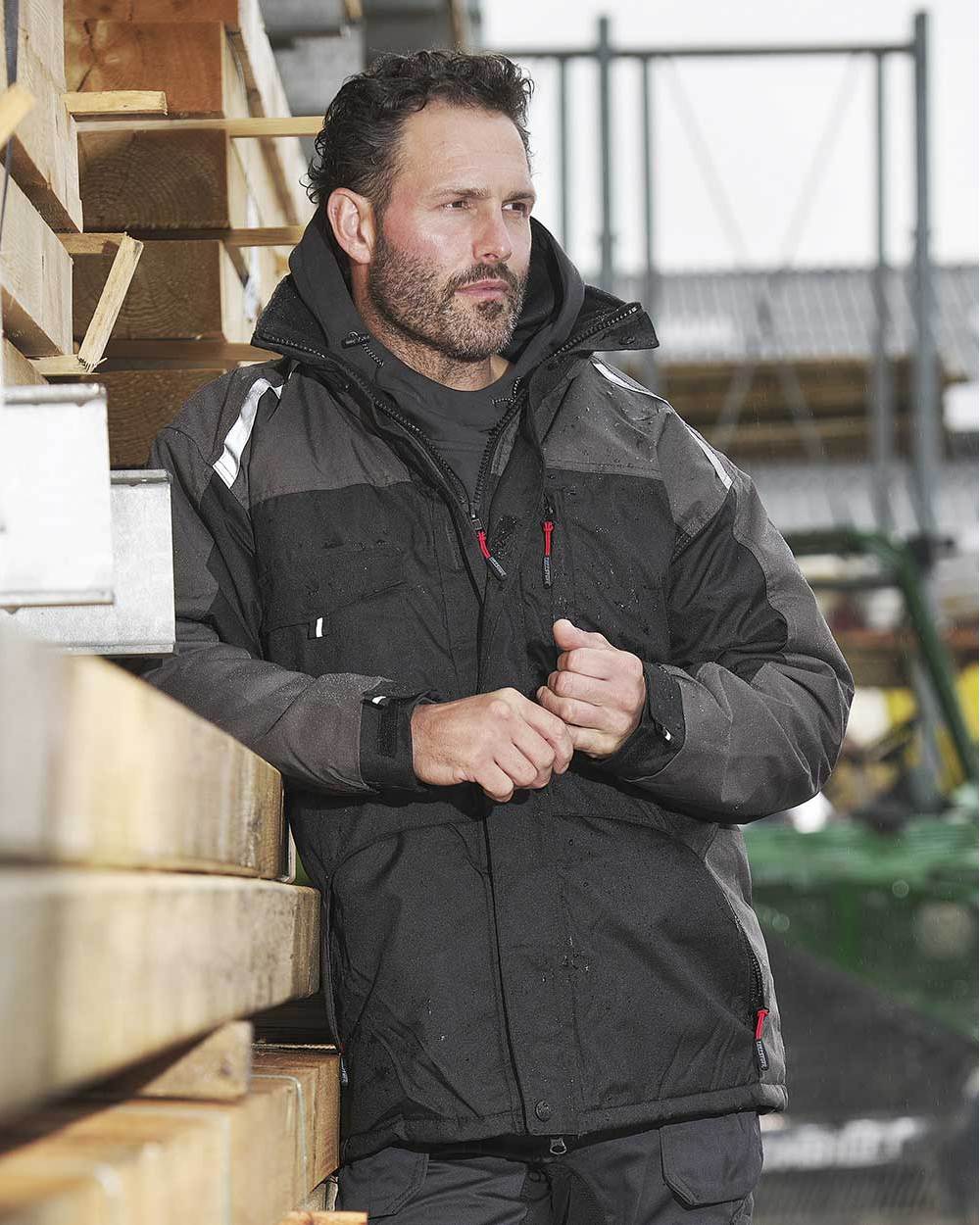 Black Coloured TuffStuff Cleveland Jacket On A Backyard Background