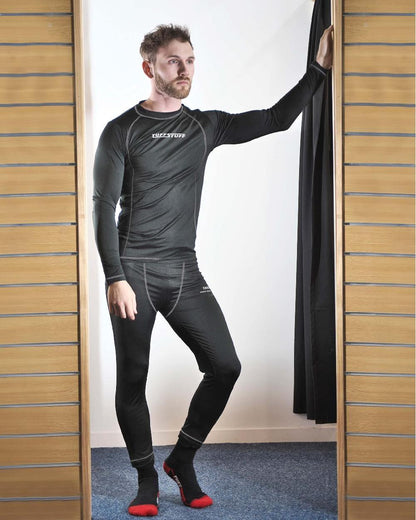 Black Coloured TuffStuff Basewear Long Sleeve T-Shirt On A Fitting Room Background