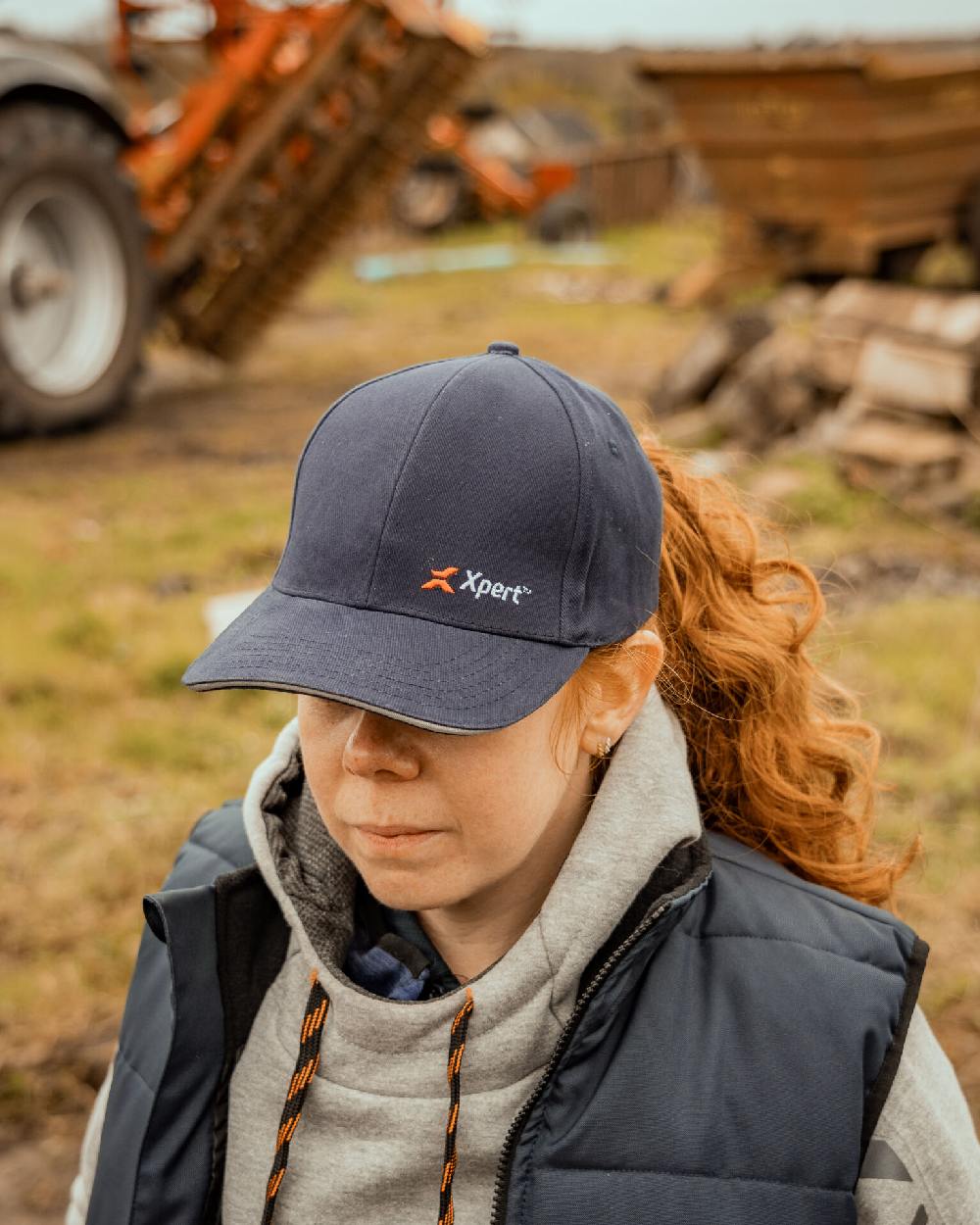 Navy Coloured Xpert Core Baseball Cap on Outdoor Background
