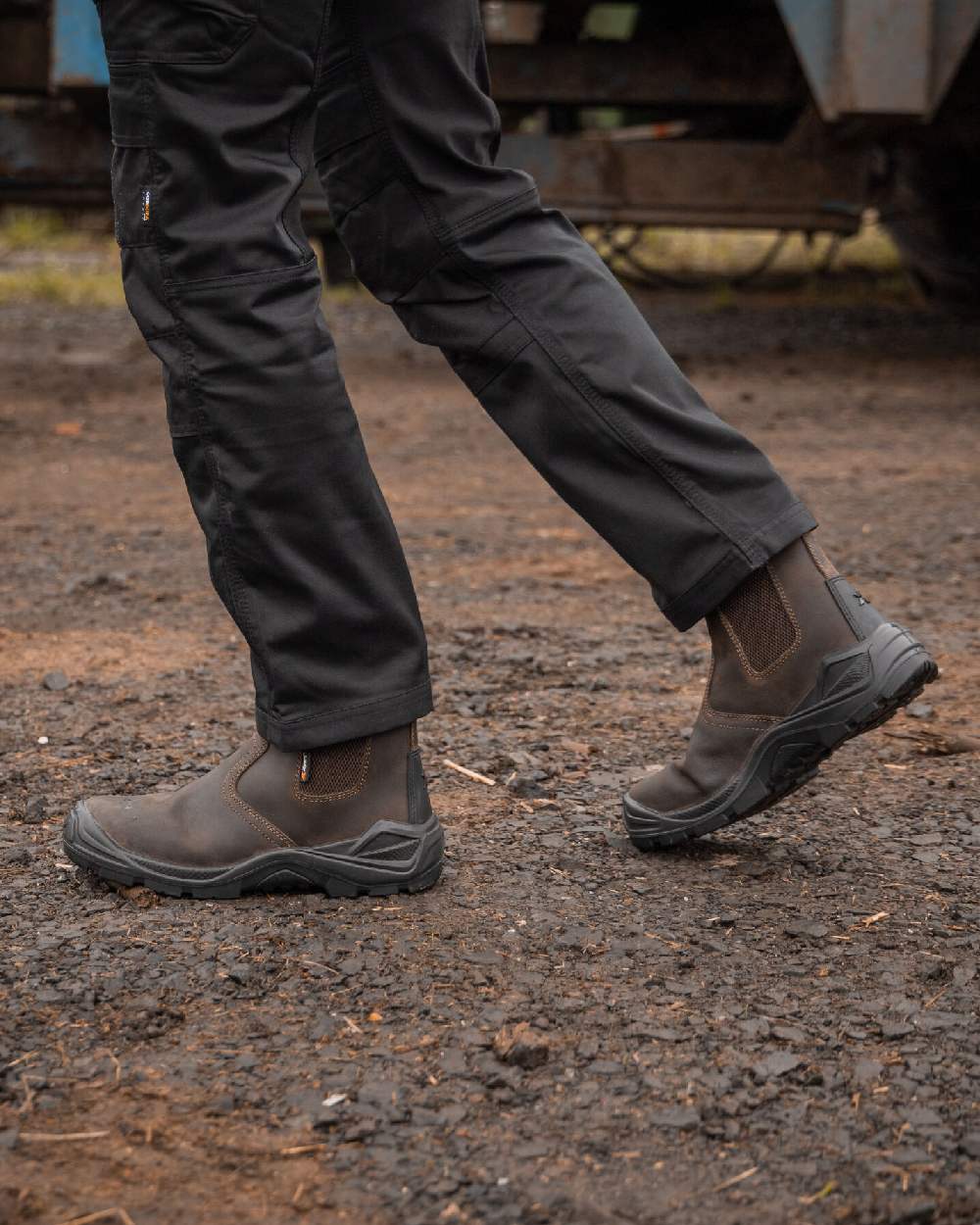 Brown Coloured Xpert Mens Defiant S3 Safety Dealer Boots on Outdoor Background
