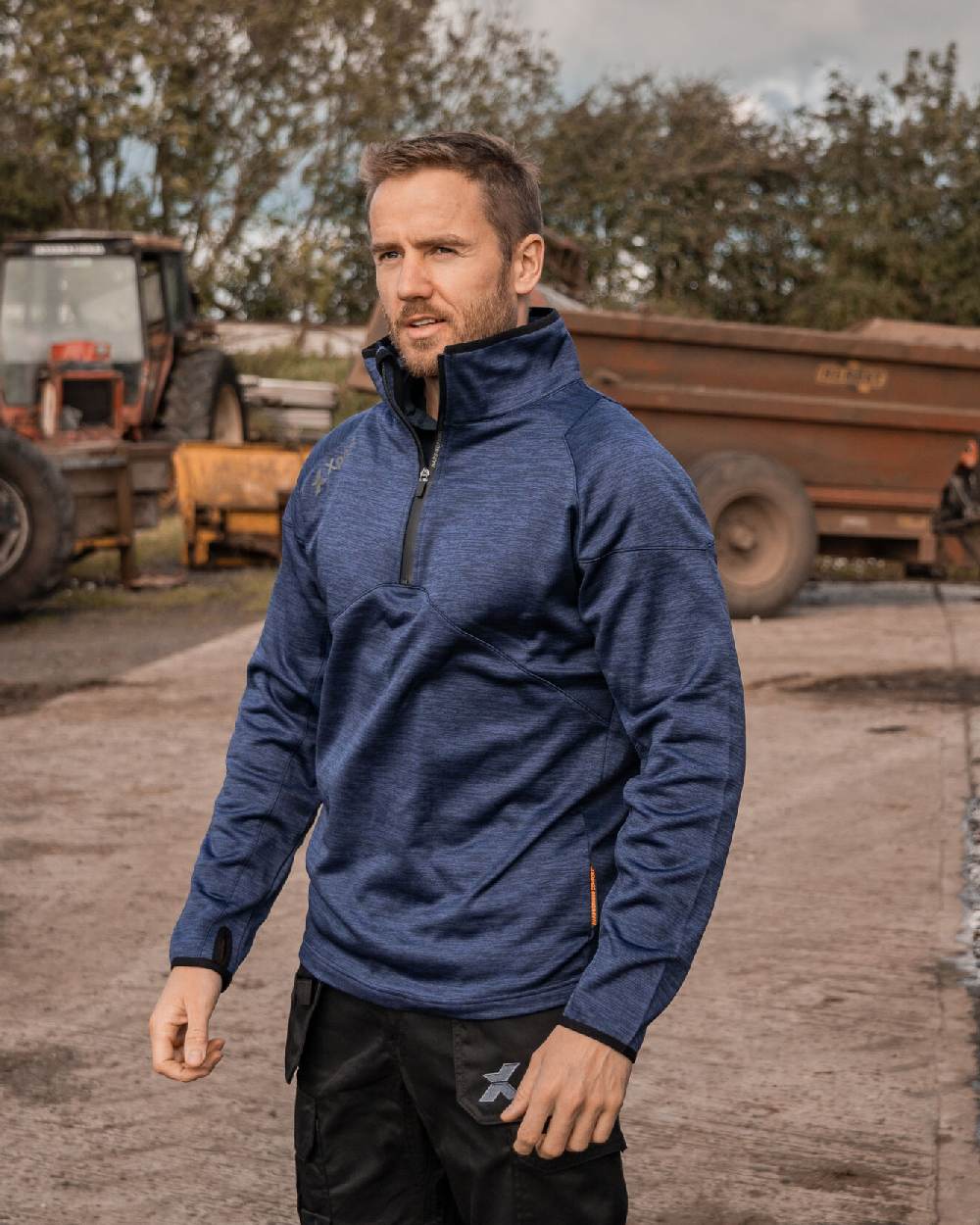 Navy Coloured Xpert Mens Pro Half Zip Tech Fleece on Outdoor Background