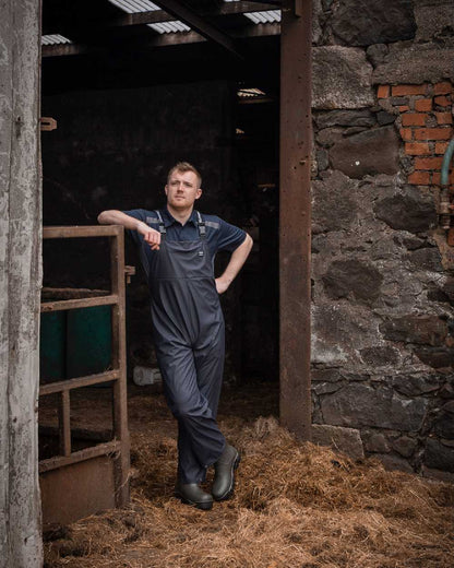 Navy Coloured Xpert Mens Swampmaster No-Sweat Stormgear Waterproof Bib &amp; Brace on Outdoor Background
