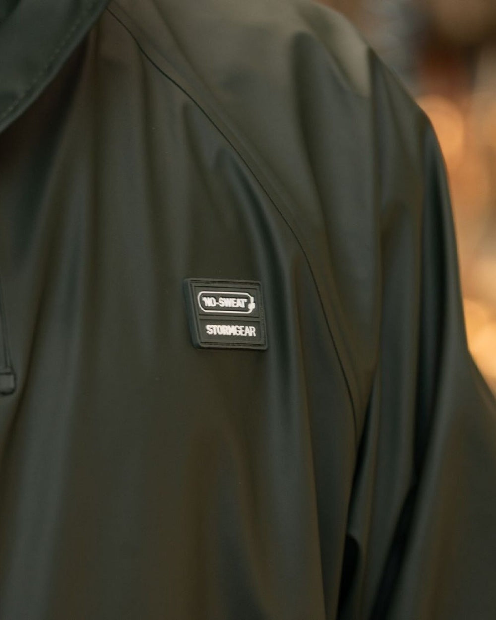 Green Coloured Xpert Swampmaster No-Sweat Stormgear Waterproof Dairy Gown on Factory Background
