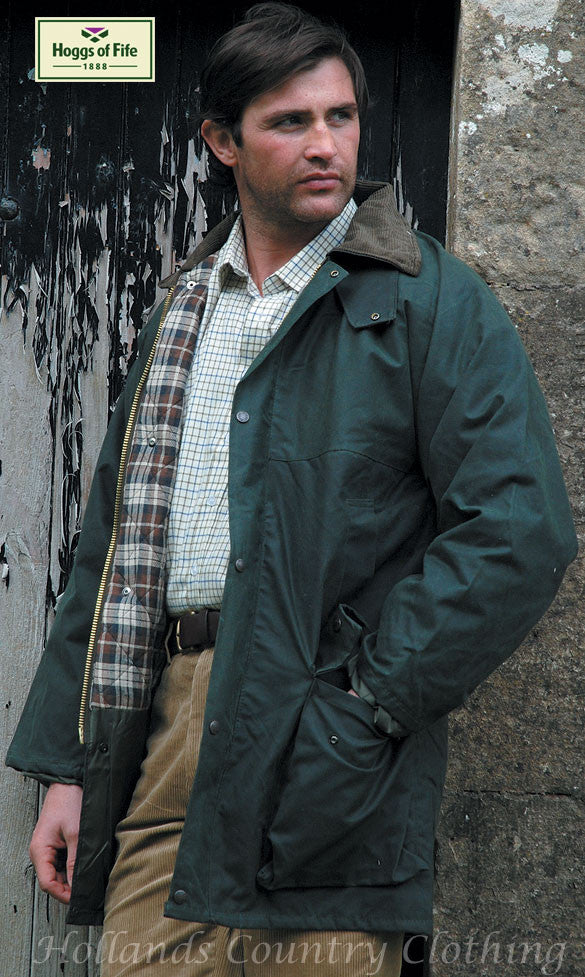 man wearing The Hoggs of Fife Padded Waxed Jacket in olive colour