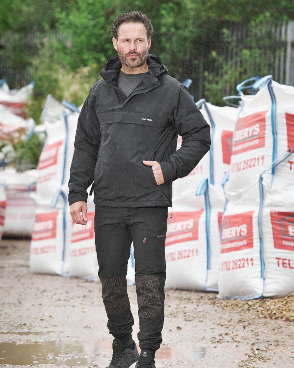 Black Coloured TuffStuff Sutherland Waterproof Windbreaker Smock On A Street Background 